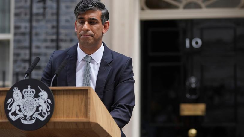 FILE - Britain's outgoing Conservative Party Prime Minister Rishi Sunak looks down as he makes a short speech outside 10 Downing Street before going to see King Charles III to tender his resignation in London, on July 5, 2024. (AP Photo/Kin Cheung, File)