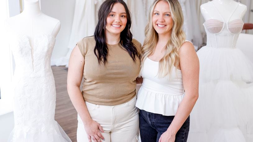 Sisters Ellie Gordon, left, and Mariana Maus are opening Frannie & Joe Bridal at 226 High Street in Hamilton. They are naming the bridal shop after their grandparents Frannie and Joe Meehan. NICK GRAHAM/STAFF