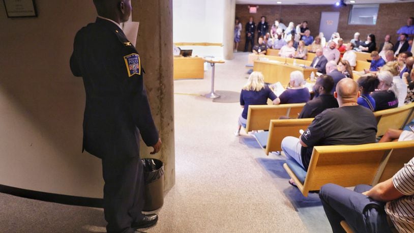 Earl Nelson waits to be sworn in as Chief of Middletown Division of Police by Middletown Municipal Court Judge James Sherron during the city council meeting Tuesday, Aug. 6, 2024 in Middletown. NICK GRAHAM/STAFF