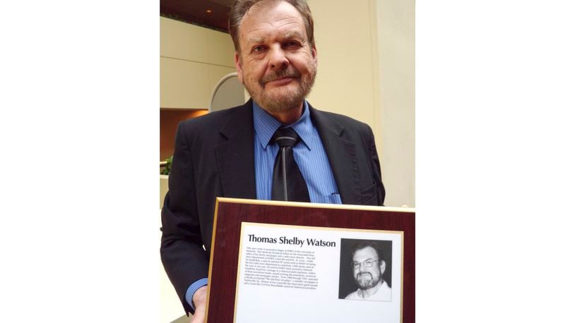 Associated Press Kentucky Broadcast Editor Tom Watson holds his plaque on his induction into the Kentucky Journalism Hall of Fame in Lexington, Ky., April 14, 2009. (AP Photo/Adam Yeomans)