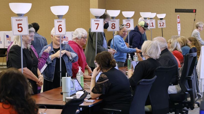 People came to vote on the first day of early voting Tuesday, Oct. 8, 2024 at Butler County Board of Elections in Hamilton. NICK GRAHAM/STAFF