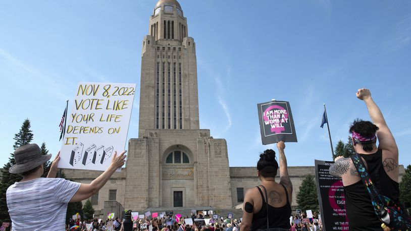 FILE - Protesters line the street around the front of the Nebraska Capitol during an Abortion Rights Rally, July 4, 2022, in Lincoln, Neb. (Kenneth Ferriera/Lincoln Journal Star via AP, File)