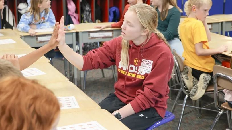 Ross High School student Kailyn May has some hearing impairment and is well-versed in American Sign Language (ASL). May is a regular volunteer Ross’ Elda Elementary, working with youngsters in helping them learn ASL along with teaching them about people with other disabilities. (Contributed Photo)