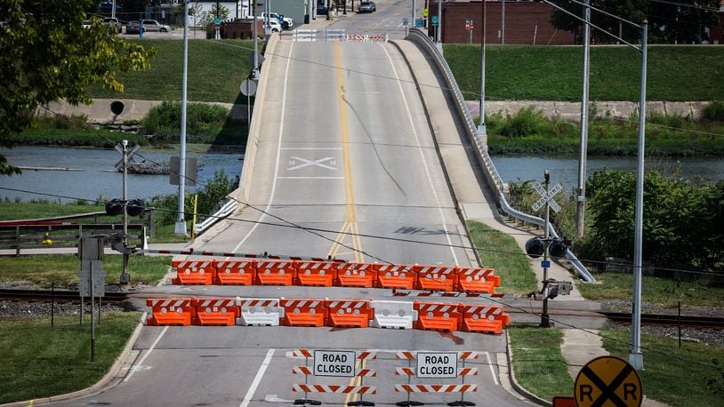 The Linden Avenue bridge is still closed Monday, Aug. 19, 2024, after a police chase and a crash into a train on Friday. It appears the railroad gate was damaged in the crash. City officials said the bridge would be closed until further notice. JIM NOELKER/STAFF