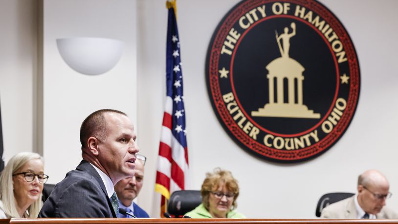 Former Hamilton Police Chief Craig Bucheit attends his first Hamilton city council meeting in his new role as city manager Wednesday, April 10, 2024. NICK GRAHAM/STAFF