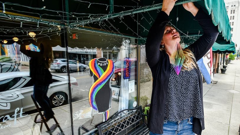 Lauren Matus, owner of Soulcraft on Central Avenue in Middletown, and many businesses downtown are showing their rainbow colors in preparation for the second annual Middletown PRIDE celebration Friday, June 21. NICK GRAHAM/STAFF