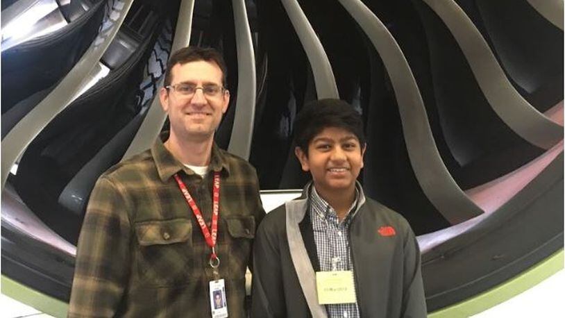 Matthew Marcum of Mentoring Partners of Cincinnati, which was founded in Butler County and he hopes to grow into a regional entity, with Atharva Rao, a student he has mentored, at GE Aviation. PROVIDED