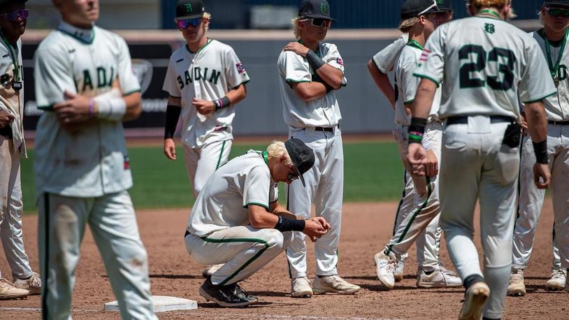 Badin High School baseball players react to falling in the Division II state final game against West Branch 3-2 on Sunday at Akron's Canal Park. Kyle Hendrix/CONTRIBUTED