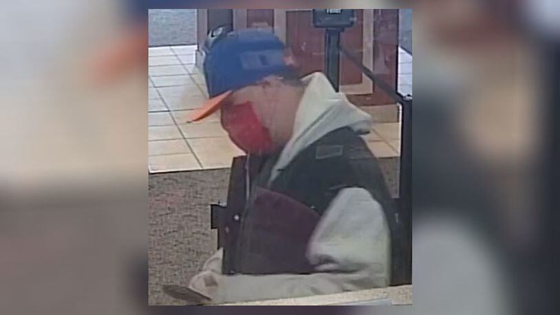 West Chester Twp. police are searching for an alleged bank robber who threatened force at the Fifth Third Bank on Cox Road last month and stole $6,350.