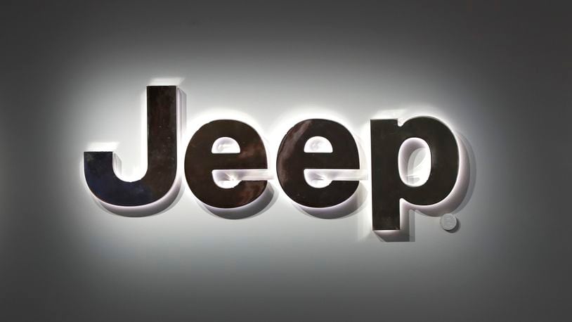 FILE - A Jeep logo is displayed at the North American International Auto Show in Detroit, Jan. 14, 2019. (AP Photo/Paul Sancya, File)