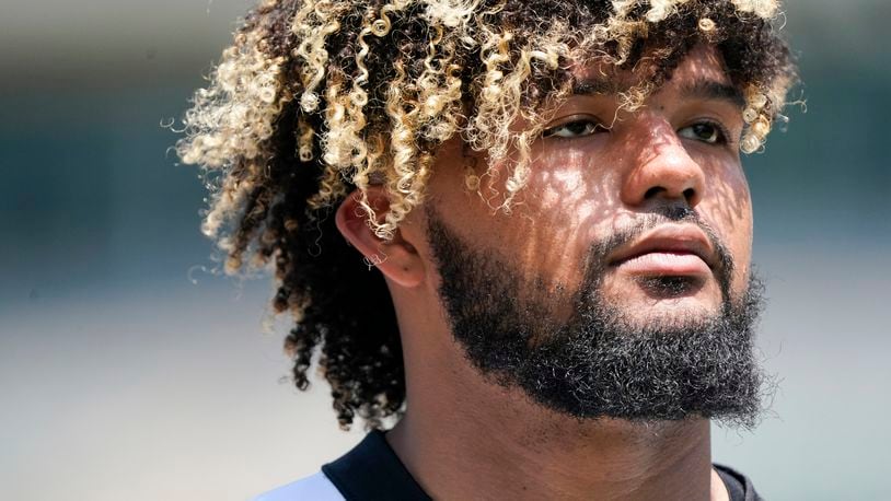 Cincinnati Bengals offensive lineman Jackson Carman takes part in drills at the team's NFL football stadium, Tuesday, June 14, 2022, in Cincinnati. (AP Photo/Jeff Dean)