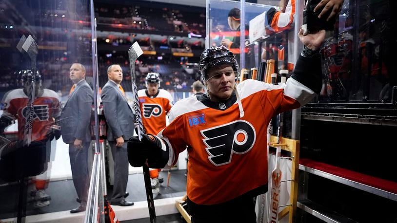 Philadelphia Flyers' Matvei Michkov walks off the ice after warming-up before a preseason NHL hockey game against the New York Islanders, Thursday, Sept. 26, 2024, in Philadelphia. (AP Photo/Matt Slocum)