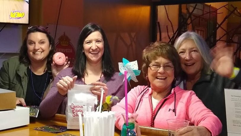 Downtown Middletown Inc. will host the 2024 Fat Tuesday Donut & Beer Walk from 6-9 p.m. Tuesday, Feb. 13. Pictured are participants from a previous year's event. CONTRIBUTED