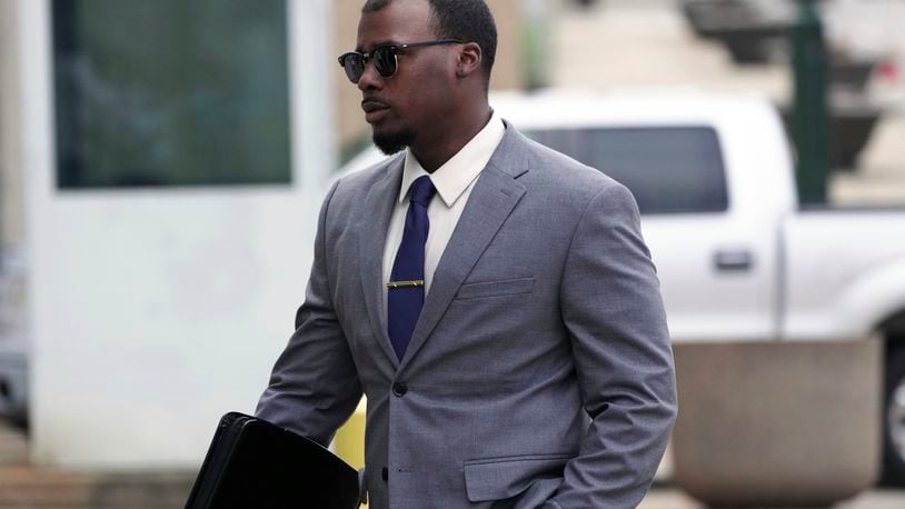 Justin Smith, one of three former Memphis police officers charged in the 2023 fatal beating of Tyre Nichol, arrives at the federal courthouse for the day's proceedings on Tuesday, Oct. 1, 2024, in Memphis, Tenn. (AP Photo/Karen Pulfer Focht)