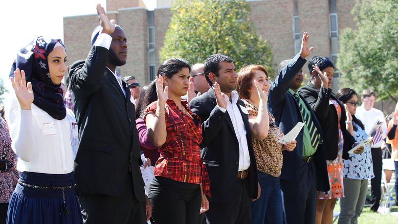 Pictured is new citizens being sworn in at the U.S. District Court for the Southern District of Ohio Naturalization Ceremony, at Miami University in September, 2016. CONTRIBUTED