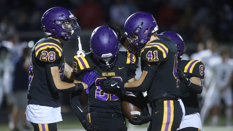 Bellbrook celebrates after an interception by Noah Barrios, center, against Valley View on Friday, Sept. 6, 2024, in Bellbrook. David Jablonski/Staff