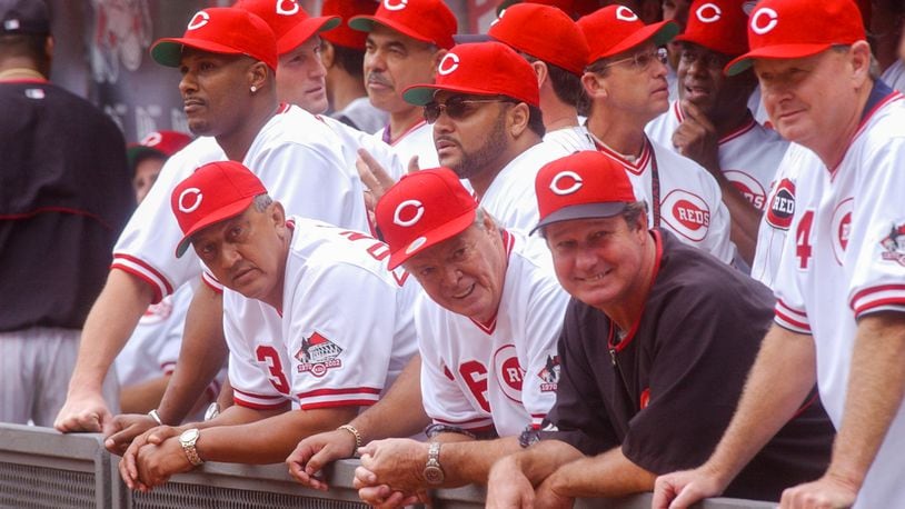 Former Reds players including Eric Davis, Dave Concepcion, Don Gullett, and Jack Billingham and others, wait in the Reds dugout prior to post-game festivities following the final game at Cinergy Field in Cincinnati on Sept. 22, 2002. Greg Lynch/STAFF FILE PHOTO