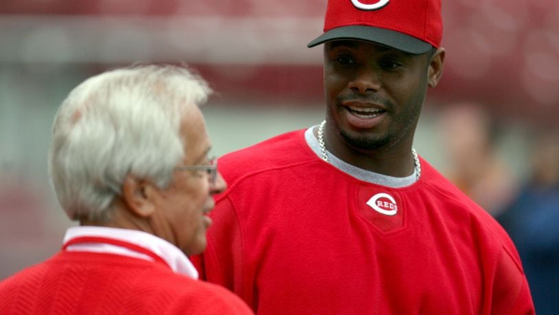 GREG LYNCH/Staff photo
Reds radio announcer Marty Brennaman talks to Reds outfielder Ken Griffey Jr. during batting practice prior to the Opening Day game against the Cubs Monday.