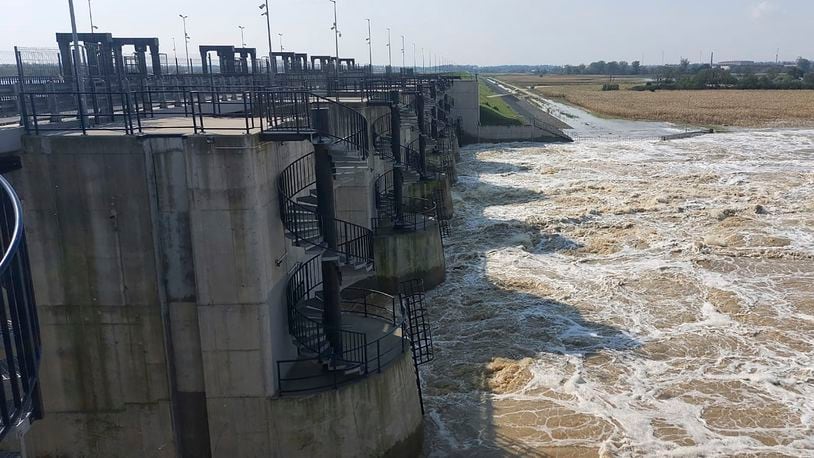 This handout photo provided by the state company Polish Waters shows the Oder River flood waters channelled into and contained by the newly-built Lower Raciborz Reservoir that has spared the cities of Opole and Wroclaw from flooding, in Raciborz, southwestern Poland, Sept. 23, 2024. (Polish Waters via AP)