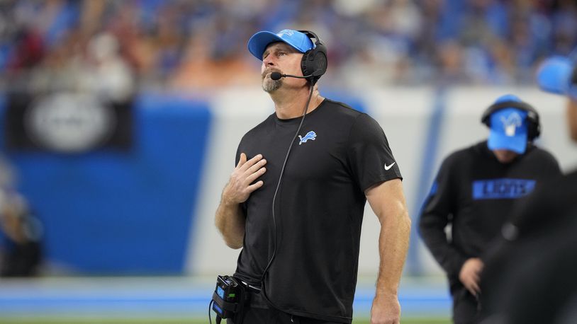 Detroit Lions head coach Dan Campbell watches during the first half of an NFL football game against the Tampa Bay Buccaneers, Sunday, Sept. 15, 2024, in Detroit. (AP Photo/Paul Sancya)