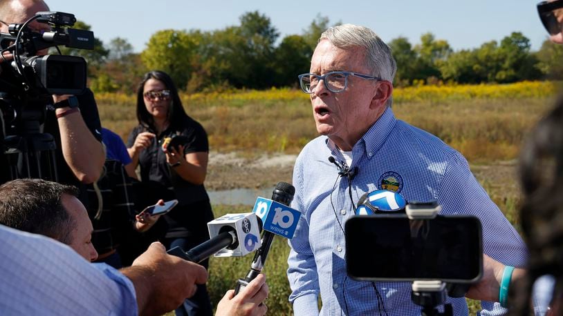 Governor Mike DeWine speaks with members of local, state and national media about Springfield and how Donald Trump mentioned the city during the debate Wednesday, Sept. 11, 2024 during a tour of the H2Ohio Rainbow Run Wetland located on Old Clifton Road in Clark County. BILL LACKEY/STAFF