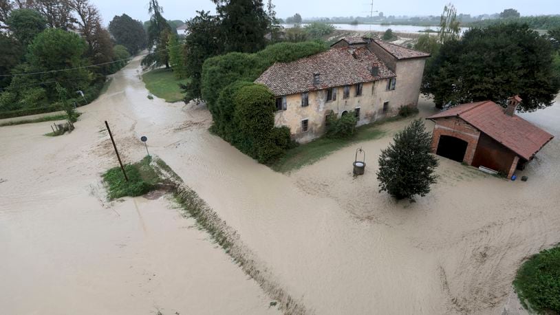 The Lamone river overflows its banks near Bagnacavallo, in the region of Emilia-Romagna, Italy, Thursday, Sept. 19, 2024. (Fabrizio Zani/LaPresse via AP)