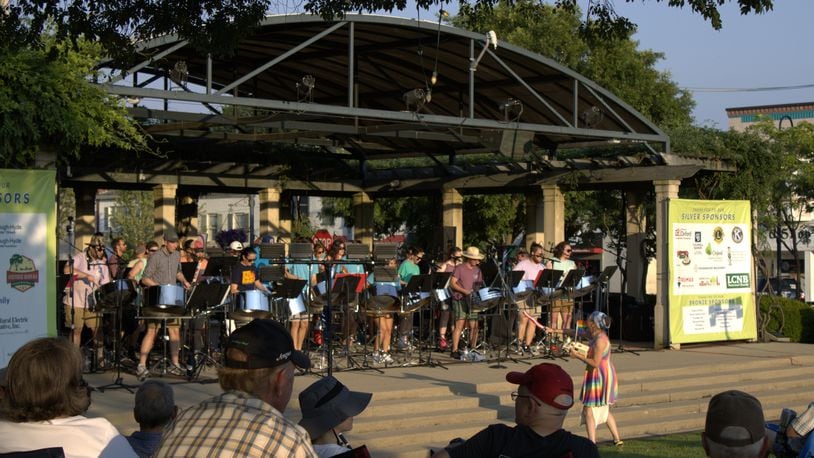 Oxford residents danced while Miami University's Steel Band played in Oxford's Memorial Park. Some residents had on pride shirts and held pride flags while they enjoyed the night.