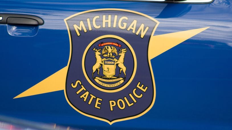 A 6-month old baby found alive by Michigan State Police in a motel room where two adults were found dead should make a full recovery, according to a local report.