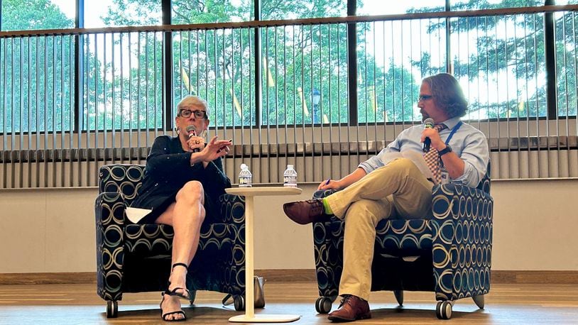 Retired Chief Justice Maureen O'Connor, left, answers questions about Issue 1, a redistricting reform that would bar politicians from drawing legislative districts. Dayton Daily News reporter Josh Sweigart, right, moderates the event at Dayton Metro Library. August 20, 2024.