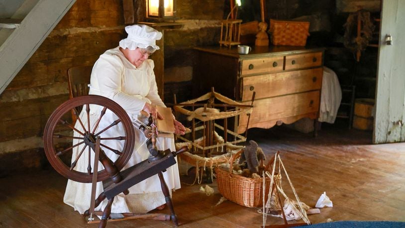 Pioneer Life, MetroParks of Butler County’s annual celebration of local history returns Oct. 12-13, 2024 at Governor Bebb MetroPark after being postponed due to the effects of Hurricane Helene. A women reenacts how yarn was spun at a previous Governor Bebb event. CONTRIBUTED