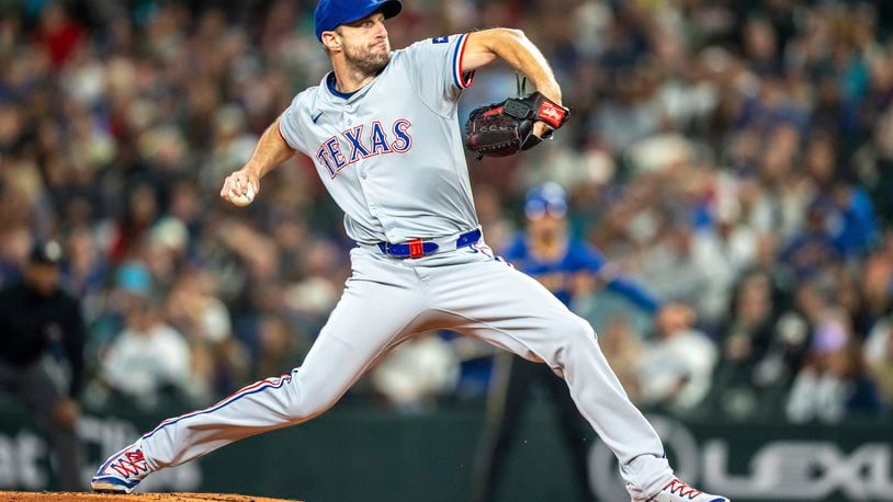 Texas Rangers starter Max Scherzer delivers a pitch during the first inning of a baseball game against the Texas Rangers, Saturday, Sept. 14, 2024, in Seattle. (AP Photo/Stephen Brashear)