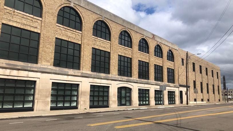 Raymond Scott, who purchased the former Middletown Journal building in 2020, said he spent $240,000 replacing 70 windows. A bar/winery was supposed to open in the basement, but those plans have been cancelled, Scott said. RICK McCRABB/STAFF