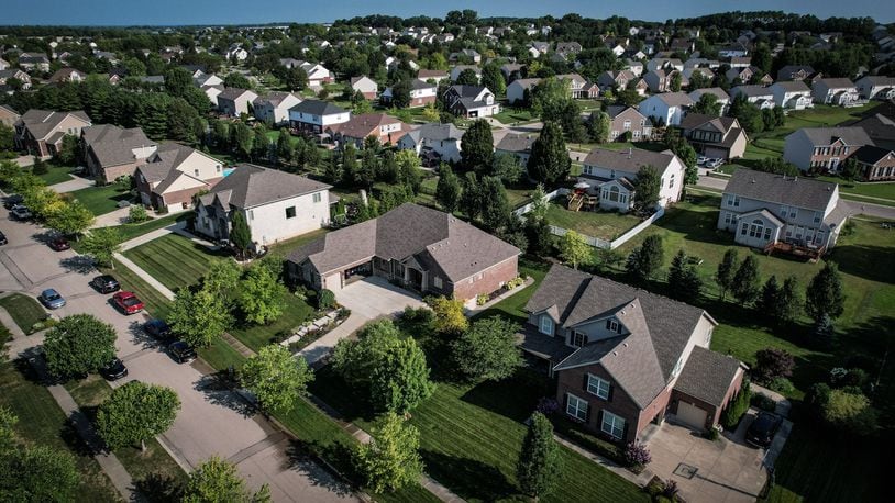 Warren County property values are projected to increase significantly in 2025, driving up real estate taxes. In Springboro, the location of the Settler's Walk neighborhood seen here, property tax rates are expected to jump about 12 or 13%, according to county Auditor Matt Nolan.  JIM NOELKER/STAFF