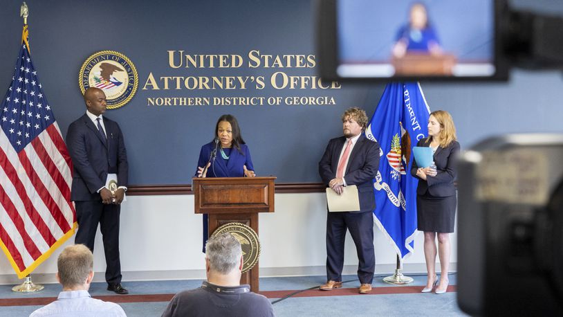 Assistant Attorney General Kristen Clarke, center, of the Justice Department's Civil Rights Division speaks about a new Department of Justice report about the state of Georgia's prisons at a press conference at the Richard B. Russell Federal Building in Atlanta, Tuesday, Oct. 1, 2024. On her left is U.S. Attorney Ryan K. Buchanan for the Northern District of Georgia and on her right are U.S. Attorney Peter D. Leary for the Middle District of Georgia and U.S. Attorney Jill E. Steinberg for the Southern District of Georgia. (Arvin Temkar/Atlanta Journal-Constitution via AP)