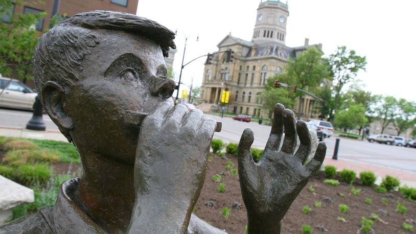 Lentil, a character in Robert McCloskey's first book "Lentil," plays the harmonica for all of downtown Hamilton in Lentil Park.