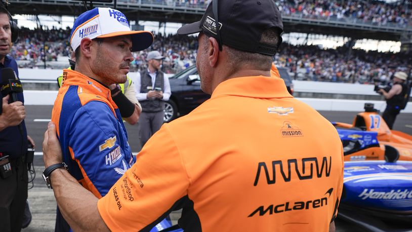 FILE - Kyle Larson, left, talks with Tony Kanaan following the Indianapolis 500 auto race at Indianapolis Motor Speedway, Sunday, May 26, 2024, in Indianapolis. (AP Photo/Darron Cummings, File)