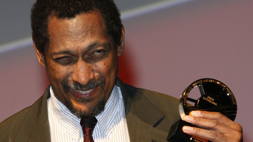 FILE - U.S. writer Percival Everett holds his trophy after he was awarded with the Literary Award at the 38th American Film Festival Sept. 5, 2012, in Deauville, Normandy, France. (AP Photo/Michel Spingler, File)