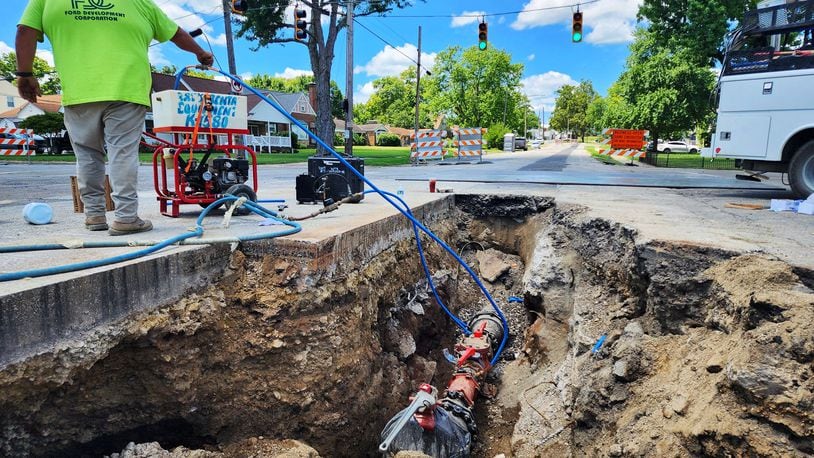 Millville avenue at Donna Avenue is closed for water main work with a large hole in the middle of the intersection Thursday, July 18, 2024 in Hamilton. NICK GRAHAM/STAFF