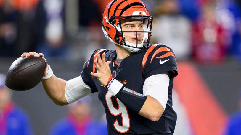 FILE - FILE - Cincinnati Bengals quarterback Joe Burrow (9) throws downfield during an NFL football game against the Buffalo Bills, Sunday, Nov. 5, 2023, in Cincinnati. (AP Photo/Zach Bolinger, File)