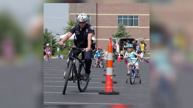 Officer Jeff Newman, a Lakota West school resource officer, is seen riding through an obstacle course at a previous bike rally. CONTRIBUTED