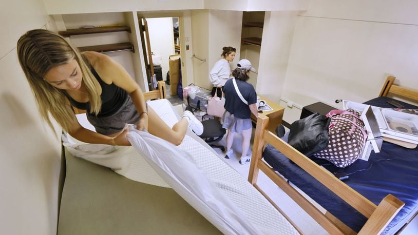 Abby Winters, from Illinois, moves in to her dorm at Tappan Hall Friday, Aug. 23, 2024 at Miami University in Oxford. NICK GRAHAM/STAFF