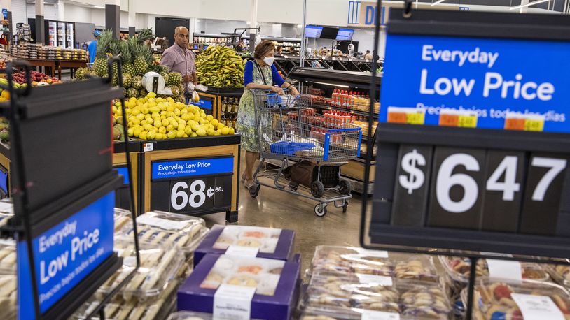 FILE - People buy groceries at a Walmart Superstore in Secaucus, New Jersey, July 11, 2024. (AP Photo/Eduardo Munoz Alvarez, File)