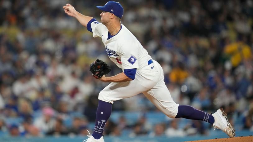 Los Angeles Dodgers starting pitcher Jack Flaherty throws during the first inning of a baseball game against the San Diego Padres in Los Angeles, Wednesday, Sept. 25, 2024. (AP Photo/Ashley Landis)