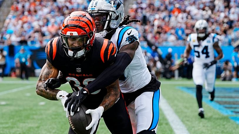 Carolina Panthers cornerback Jaycee Horn breaks up a pass intended for Cincinnati Bengals running back Chase Brown during the first half of an NFL football game, Sunday, Sept. 29, 2024, in Charlotte, N.C. (AP Photo/Rusty Jones)