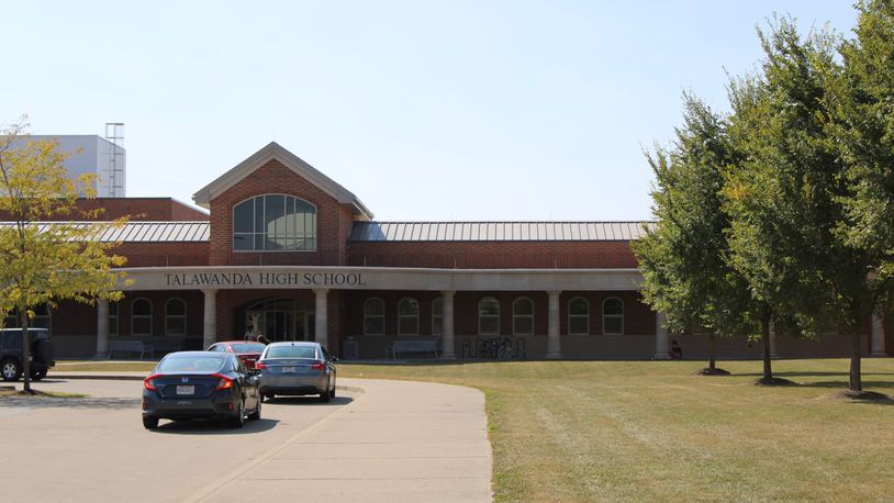 A man with a megaphone made inflammatory statements on Talawanda High School property as students arrived to school Tuesday morning. OPD warned him against trespassing. SEAN SCOTT/OXFORD FREE PRESS