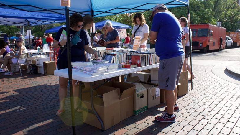 Oxford shut down High Street on Aug. 4 for Books on the Bricks, a Red Brick Friday event. The night featured a book sale, music, a spelling bee and local authors and organizations. SEAN SCOTT/STAFF