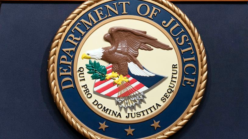 FILE - The Department of Justice seals is seen during a news conference at the DOJ office in Washington, May 16, 2023. (AP Photo/Jose Luis Magana, File)