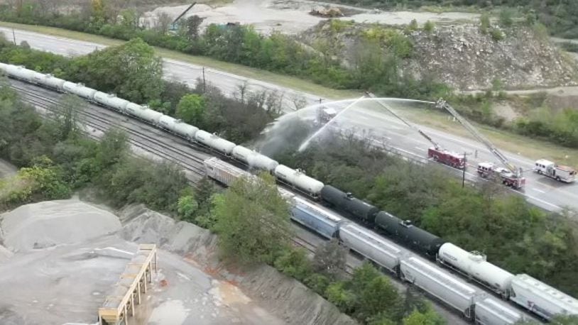 WCPO's Sky 9 captured firefighters putting water on a train car that appears to be releasing a chemical into the air in the Cleves and Whitewater Township area. Residents were asked to evacuate or remain indoors.