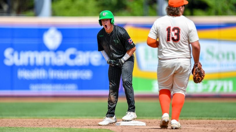 Badin's Austin Vangen celebrates a double against Parma Padua Franciscan during a Division II state semifinal Friday morning at Akron's Canal Park. Kyle Hendrix/CONTRIBUTED