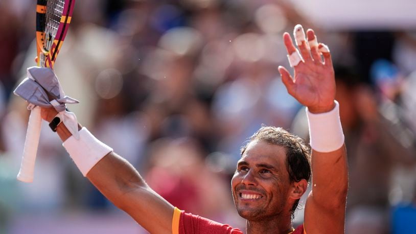 FILE - Rafael Nadal of Spain celebrates his victory over Marton Fucsovics of Hungary during the men's singles tennis competition, at the 2024 Summer Olympics, Sunday, July 28, 2024, in Paris, France, as he has announced he will retire from tennis at age 38 following the Davis Cup finals in November. (AP Photo/Manu Fernandez, File)